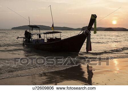 Traditional boat moored on beach View Large Photo Image Stock Photograph - Traditional boat moored on beach. Fotosearch