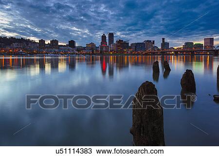 View of city at sunset View Large Photo Image Stock Image - View of city at sunset. Fotosearch