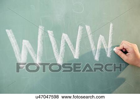 Stock Photo - View of letters on blackboard and girl's hand. Fotosearch