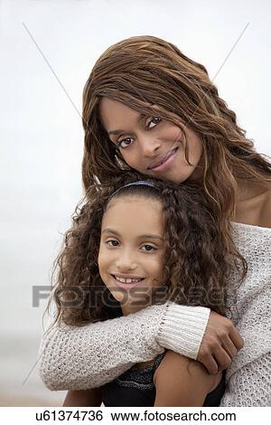 Woman and her daughter (8-9) on Sea Cliff View Large Photo Image Stock Photograph - Woman and her daughter (8-9) on Sea Cliff. Fotosearch