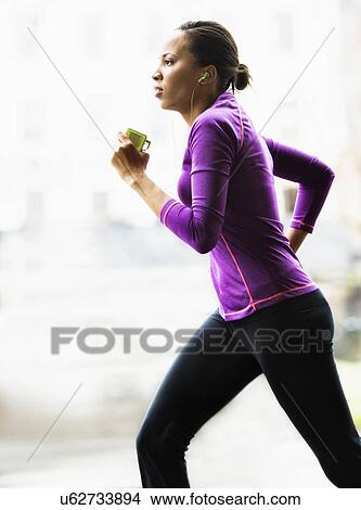 Woman jogging View Large Photo Image Picture - Woman jogging. Fotosearch