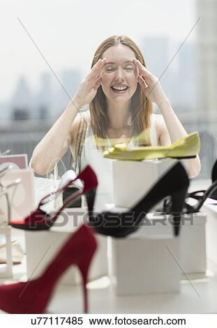 Woman shopping for shoes View Large Photo Image Stock Photography - Woman shopping for shoes. Fotosearch