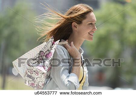 Woman with shopping bags View Large Photo Image Stock Photo - Woman with shopping bags. Fotosearch