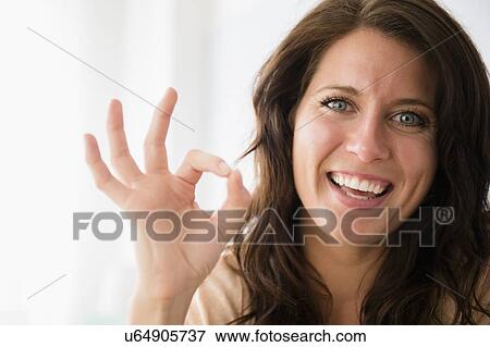 Stock Photo - Young woman gesturing. Fotosearch