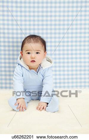 Baby boy sitting View Large Photo Image Stock Image - Baby boy sitting. Fotosearch