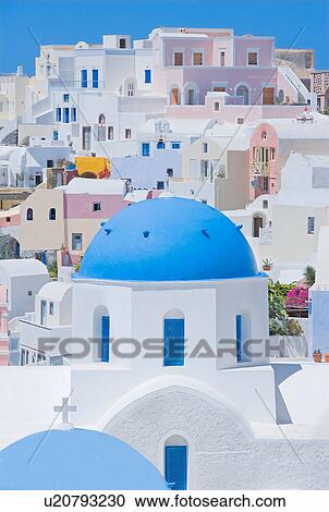 Stock Image - Blue domed church, Oia, Santorini, Greece. Fotosearch