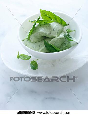 Bowl of basil ice cream with garnish View Large Photo Image Stock Photo - Bowl of basil ice cream with garnish. Fotosearch