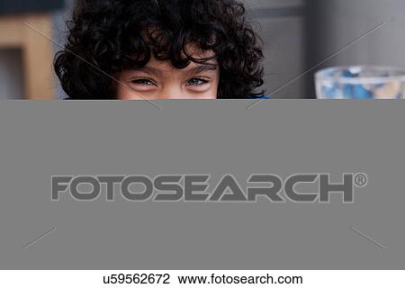 Boy smiling with snacks and glass of milk View Large Photo Image Stock Image - Boy smiling with snacks and glass of milk. Fotosearch
