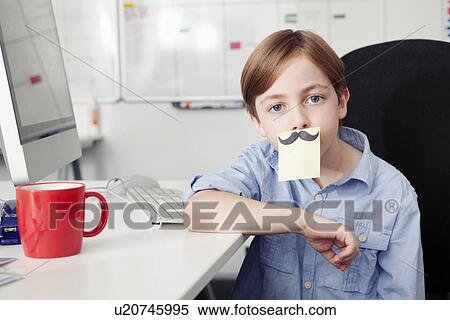 Boy with adhesive note covering mouth, drawing of moustache View Large Photo Image Stock Photography - Boy with adhesive note covering mouth, drawing of moustache. Fotosearch