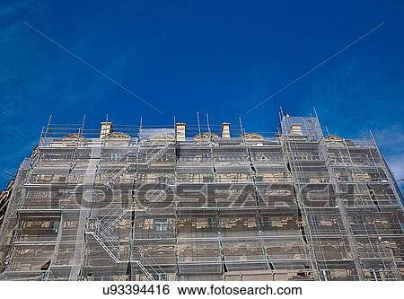 Building exterior covered in scaffold, Marseilles, France View Large Photo Image Stock Photograph - Building exterior covered in scaffold, Marseilles, France. Fotosearch