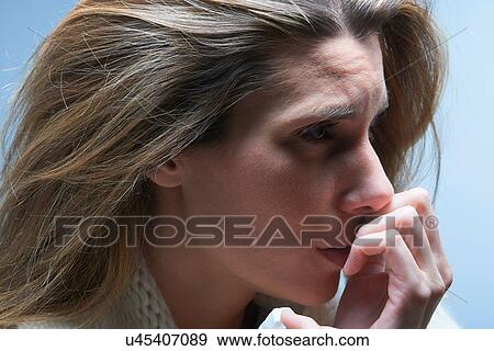 Close up of anxious woman with hand on mouth View Large Photo Image Stock Photo - Close up of anxious woman with hand on mouth. Fotosearch