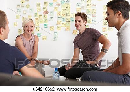 Colleagues in discussion View Large Photo Image Stock Image - Colleagues in discussion. Fotosearch