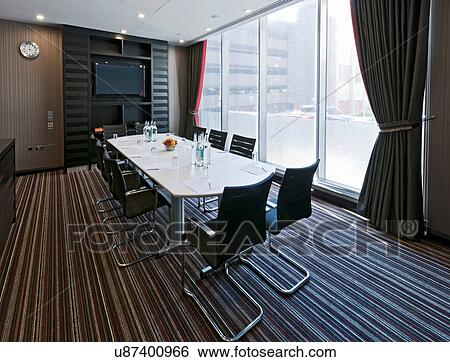Stock Photograph - Conference table set for meeting. Fotosearch
