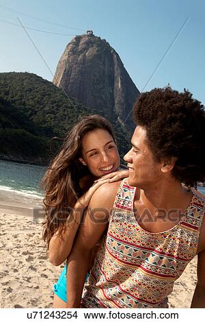 Picture - Couple on beach, Rio de Janeiro, Brazil. Fotosearch