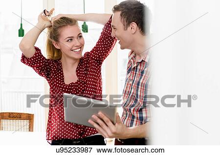 Stock Photo - Couple talking. Fotosearch