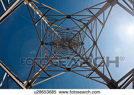 Electricity pylon, low angle view View Large Photo Image Stock Photography - Electricity pylon, low angle view. Fotosearch