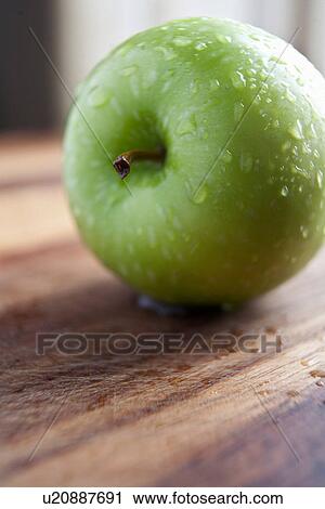 Stock Image - Fresh green apple. Fotosearch
