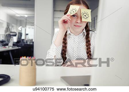 Girl in office with adhesive notes covering eyes, peeking View Large Photo Image Stock Photography - Girl in office with adhesive notes covering eyes, peeking. Fotosearch