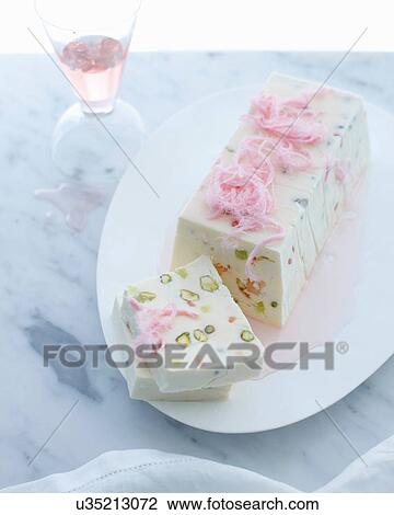Stock Image - Moroccan terrine with pistachio and turkish delight. Fotosearch