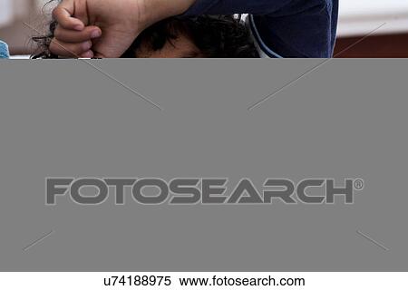 Stock Photography - Mother and son using digital tablet. Fotosearch