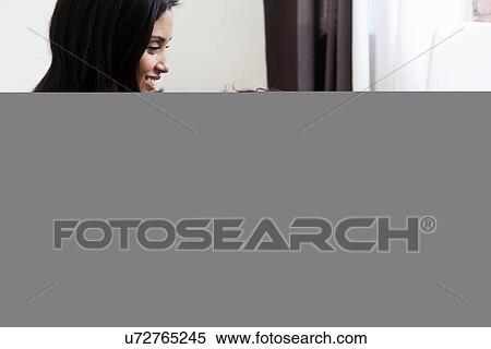 Mother and son using laptop View Large Photo Image Stock Photography - Mother and son using laptop. Fotosearch