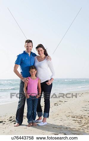 Parents and daughter at beach View Large Photo Image Stock Photo - Parents and daughter at beach. Fotosearch