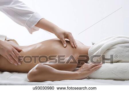 Person massaging woman's shoulder View Large Photo Image Stock Image - Person massaging woman's shoulder. Fotosearch