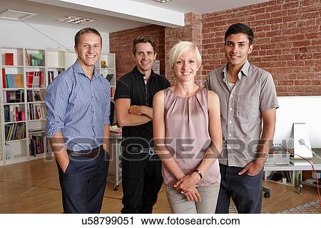 Portrait of colleagues in creative office View Large Photo Image Stock Image - Portrait of colleagues in creative office. Fotosearch