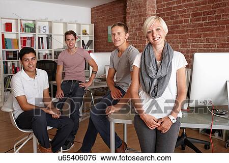 Portrait of colleagues in creative office View Large Photo Image Stock Photograph - Portrait of colleagues in creative office. Fotosearch