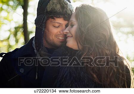 Portrait of couple in autumn sunlight View Large Photo Image Picture - Portrait of couple in autumn sunlight. Fotosearch