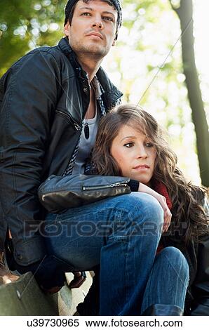 Stock Photography - Portrait of couple, woman leaning on man. Fotosearch