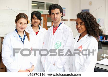 Portrait of four college students wearing lab coats View Large Photo Image Stock Photograph - Portrait of four college students wearing lab coats. Fotosearch