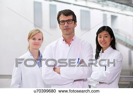 Portrait of group of scientists in atrium View Large Photo Image Stock Image - Portrait of group of scientists in atrium. Fotosearch