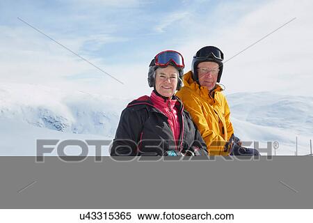 Portrait of senior couple skiing, Hermavan, Sweden View Large Photo Image Stock Photography - Portrait of senior couple skiing, Hermavan, Sweden. Fotosearch