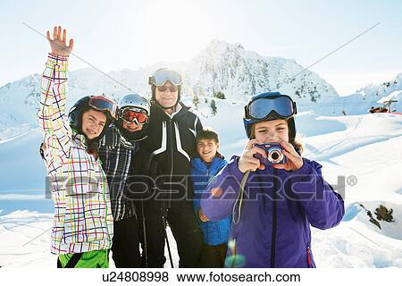 Stock Photo - Portrait of skiing family, Les Arcs, Haute-Savoie, France. Fotosearch