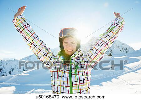 Portrait of teenage girl skier with arms outstretched, Les Arcs, Haute-Savoie, France View Large Photo Image Stock Image - Portrait of teenage girl skier with arms outstretched, Les Arcs, Haute-Savoie, France. Fotosearch