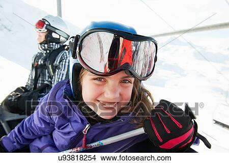 Portrait of young girl on ski lift, Les Arcs, Haute-Savoie, France View Large Photo Image Picture - Portrait of young girl on ski lift, Les Arcs, Haute-Savoie, France. Fotosearch