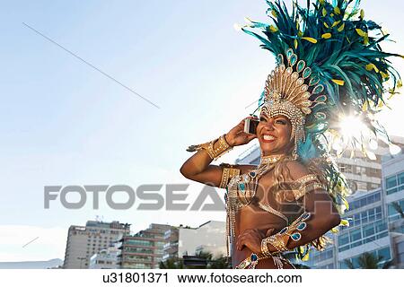 Samba dancer using cellphone, Ipanema Beach, Rio De Janeiro, Brazil View Large Photo Image Stock Image - Samba dancer using cellphone, Ipanema Beach, Rio De Janeiro, Brazil. Fotosearch