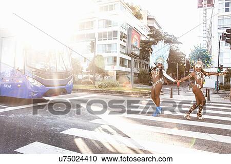 Samba dancers crossing a road, Ipanema Beach, Rio De Janeiro, Brazil View Large Photo Image Stock Image - Samba dancers crossing a road, Ipanema Beach, Rio De Janeiro, Brazil. Fotosearch