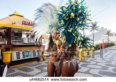 Samba dancers drinking coconut drink, Ipanema Beach, Rio De Janeiro, Brazil View Large Photo Image Picture - Samba dancers drinking coconut drink, Ipanema Beach, Rio De Janeiro, Brazil. Fotosearch