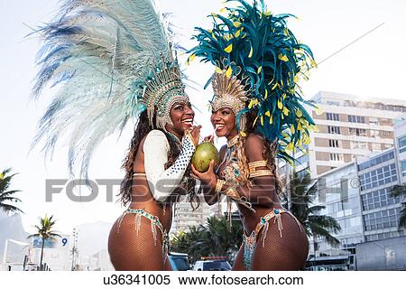 Samba dancers drinking coconut drink, Ipanema Beach, Rio De Janeiro, Brazil View Large Photo Image Stock Photography - Samba dancers drinking coconut drink, Ipanema Beach, Rio De Janeiro, Brazil. Fotosearch