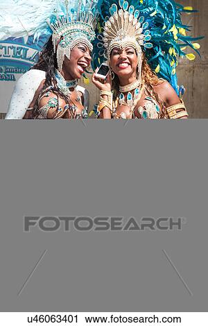 Samba dancers using cellphone, Rio De Janeiro, Brazil View Large Photo Image Stock Image - Samba dancers using cellphone, Rio De Janeiro, Brazil. Fotosearch