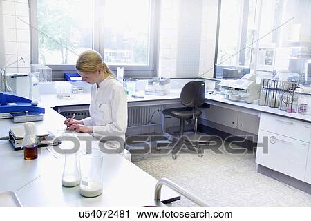 Scientist writing notes View Large Photo Image Stock Image - Scientist writing notes. Fotosearch
