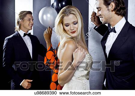 Small group of people dancing in club View Large Photo Image Stock Image - Small group of people dancing in club. Fotosearch
