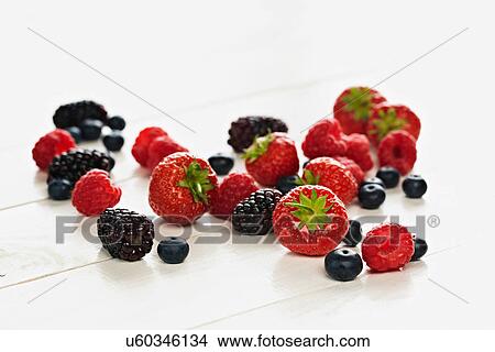 Strawberries, raspberries, blackberries and blueberries still life View Large Photo Image Picture - Strawberries, raspberries, blackberries and blueberries still life. Fotosearch