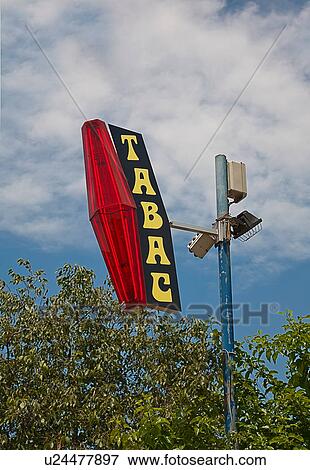 Stock Photo - Tabac sign on lamp post. Fotosearch