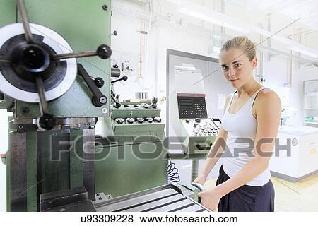 Technician working in optical laboratory View Large Photo Image Stock Photo - Technician working in optical laboratory. Fotosearch