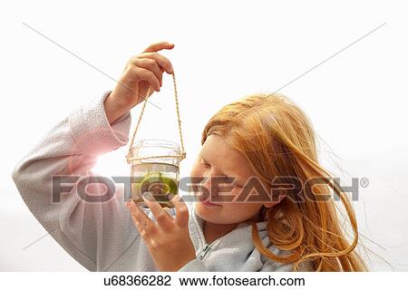 Teenage girl holding jar View Large Photo Image Stock Image - Teenage girl holding jar. Fotosearch