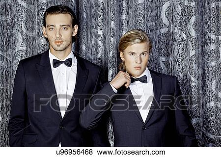 Two young men in bow ties View Large Photo Image Stock Photo - Two young men in bow ties. Fotosearch