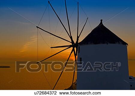 Stock Image - Windmill, Oia, Santorini, Greece. Fotosearch